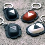Dainese Knee Slider Keyrings - Various Colours